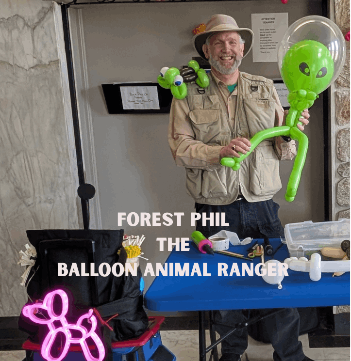 Forest Phil the Balloon Animal Ranger twisting balloons at fundraiser in Hamilton
