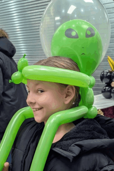 Girl wearing Balloon Alien hat by Phil the Balloon Guy in Stoney Creek