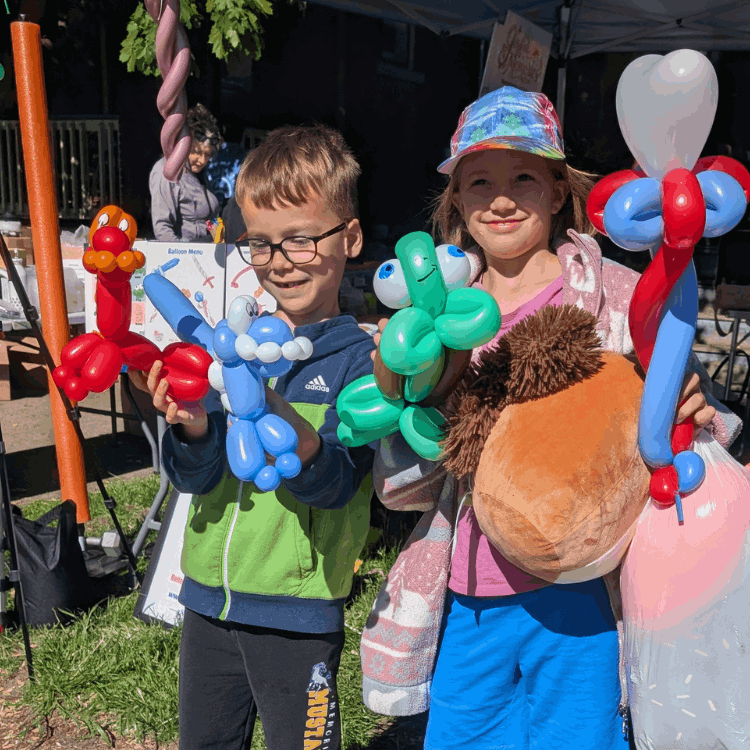 Girl with Pokeman Balloon Animal and Face Paint