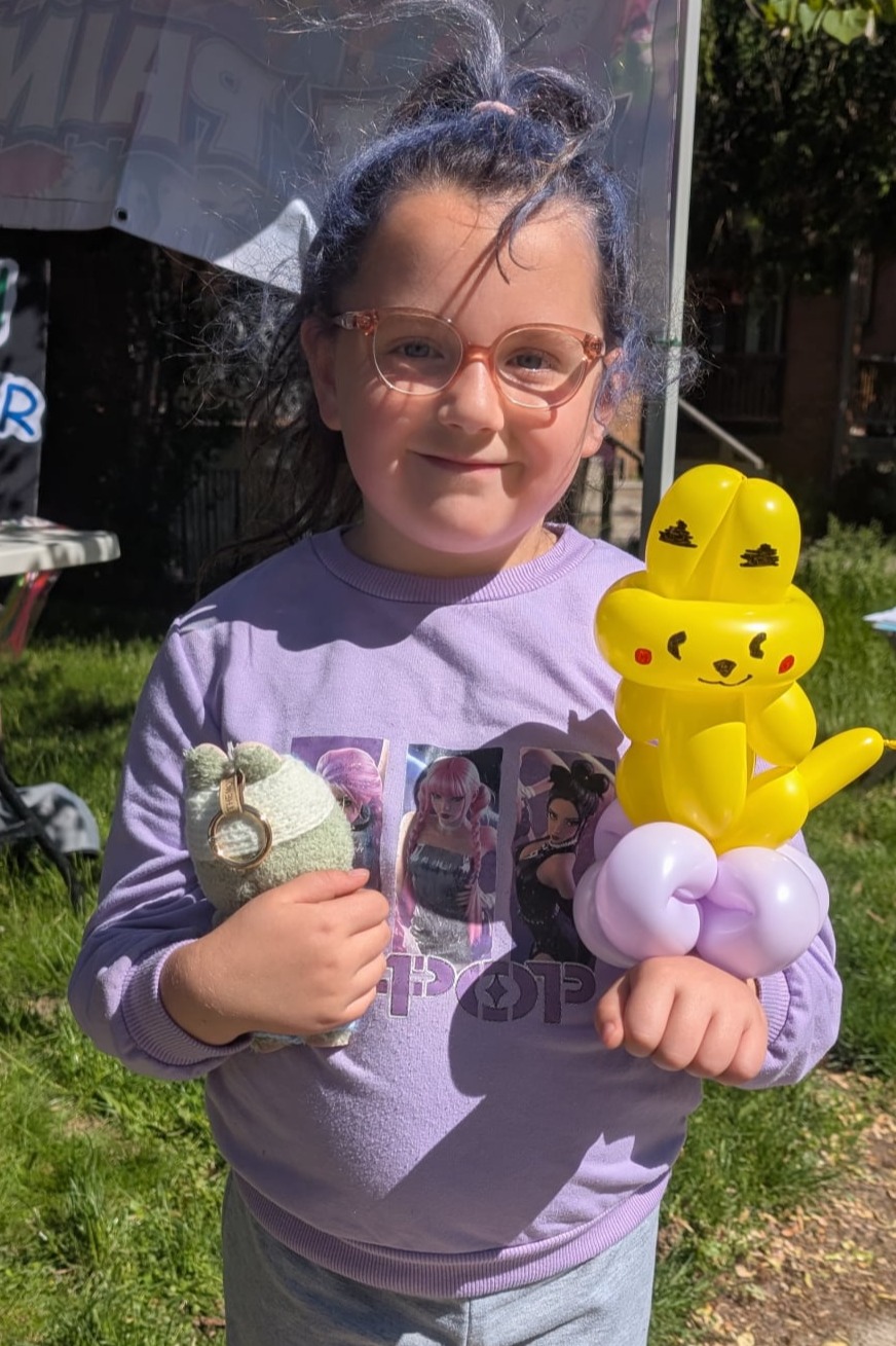 Girl with Twisted Balloon Animal in Hamilton Ontario