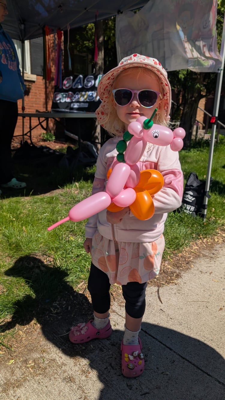 Girl with Balloon Animal at Event in Hamilton Ontario